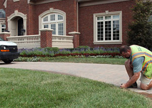 one of our contractors is checking the range of a sprinkler head